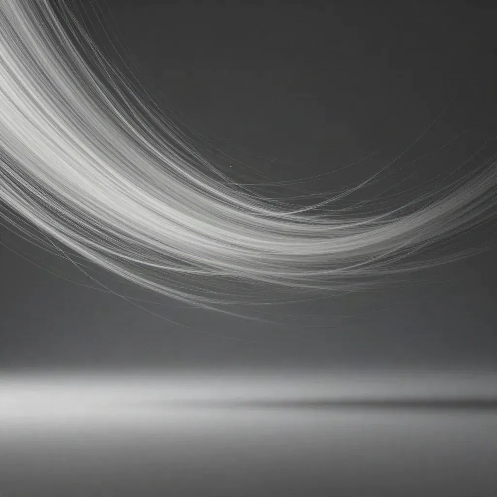 Abstract silver filaments converging in graphite haze with a soft white bloom.